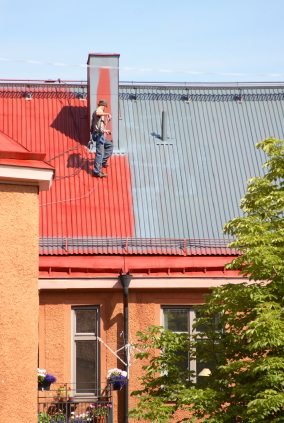 Roof painting in Hallandale, FL by Watson's Painting & Waterproofing Company.