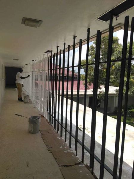 Metal Fence Painting in Plantation, FL (1)