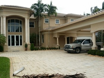 Repainting of two story home in Davie, Florida
