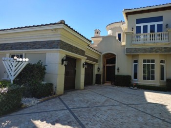 Exterior painting in Village of Golf, FL.